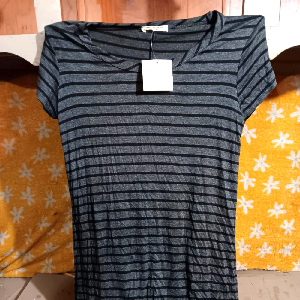 Soft and comfortable woman's shirt made by Oliva Rae, size M.